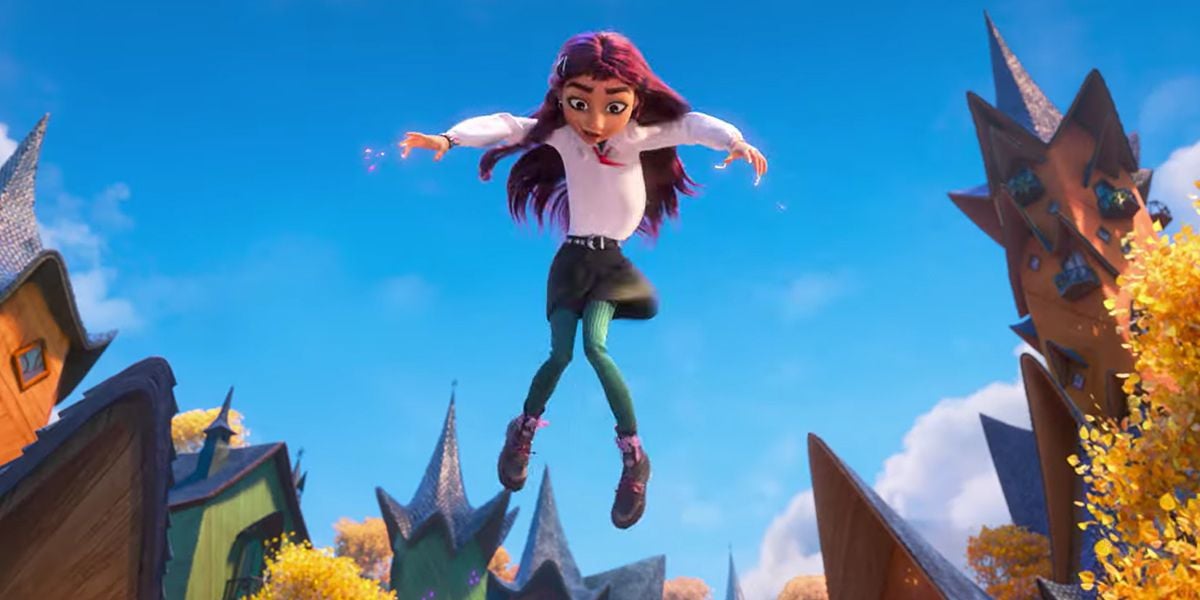 Whimsical red-haired cartoon girl in green pants leaps magically above fantasyland rooftops below a bright blue sky.