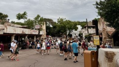 Guests stroll through Africa at Disney's ANimal Kingdom Theme Park