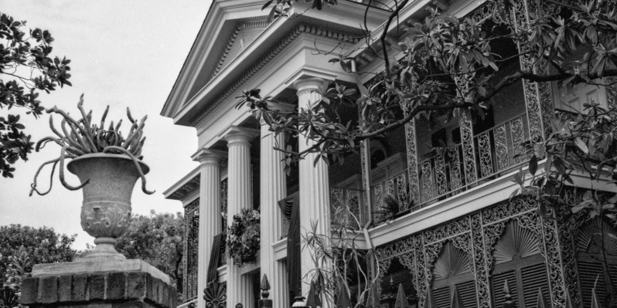 Black and white photo of the Haunted Mansion at Disneyland