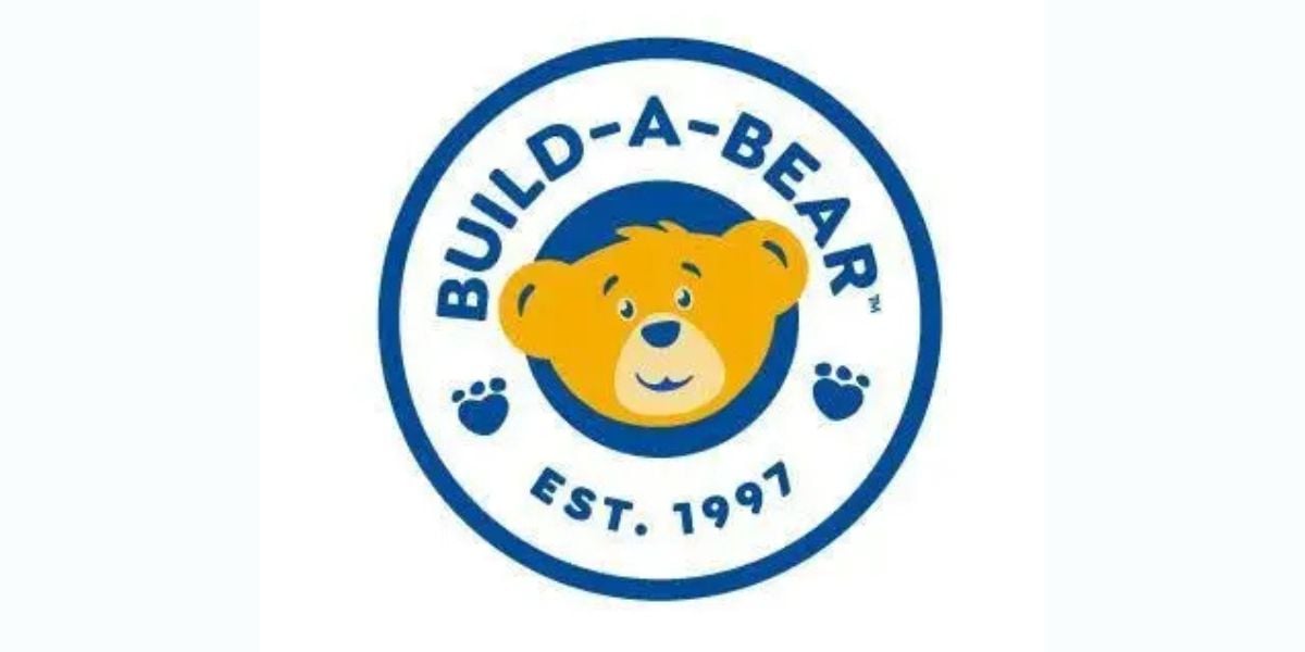 Build-A-Bear logo with its iconic bear face in a playful blue circle, "Est. 1997" below—just like at Build-A-Bear Workshop.