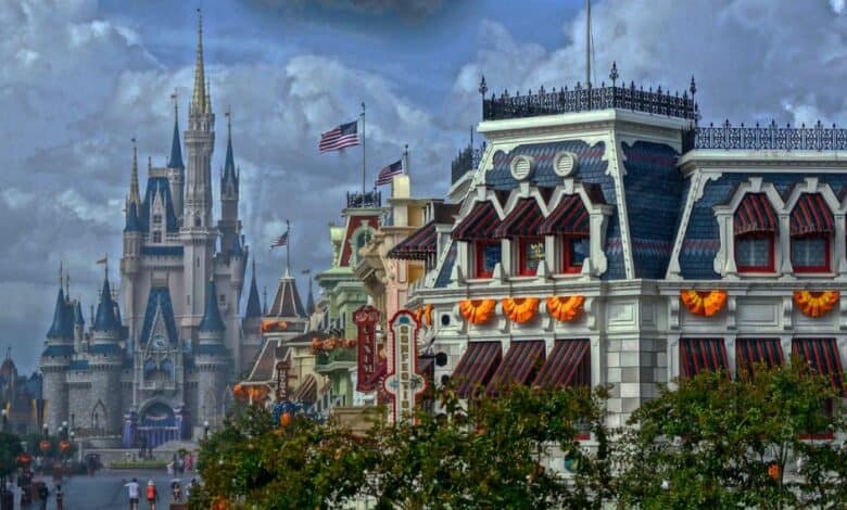 Cinderella Castle behind Halloween decorations on Main Street, USA, at Magic Kingdom at Walt Disney World Resort