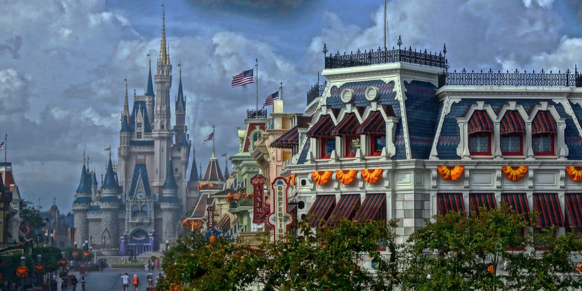 Cinderella Castle behind Halloween decorations on Main Street, USA, at Magic Kingdom at Walt Disney World Resort