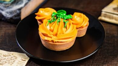 mickey mouse pumpkin cheesecake treat for halloween season at disney world