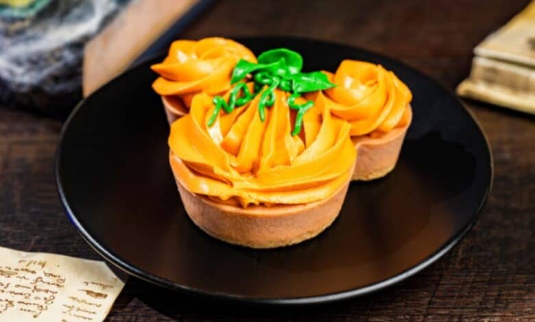 mickey mouse pumpkin cheesecake treat for halloween season at disney world