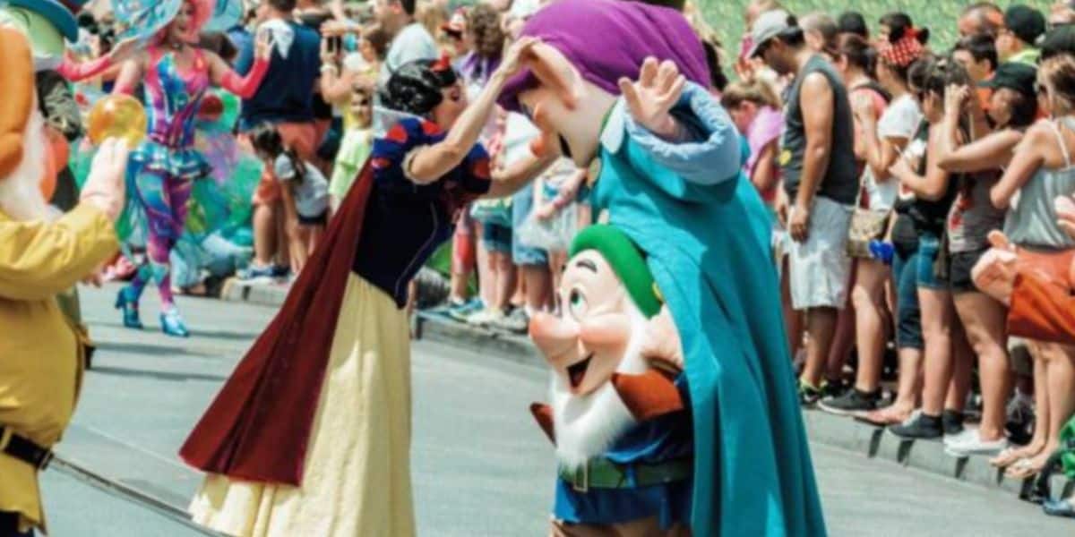Snow White greets the Seven Dwarfs during Festival of Fantasy