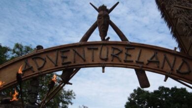 The Adventureland entrance sign at Disneyland Park