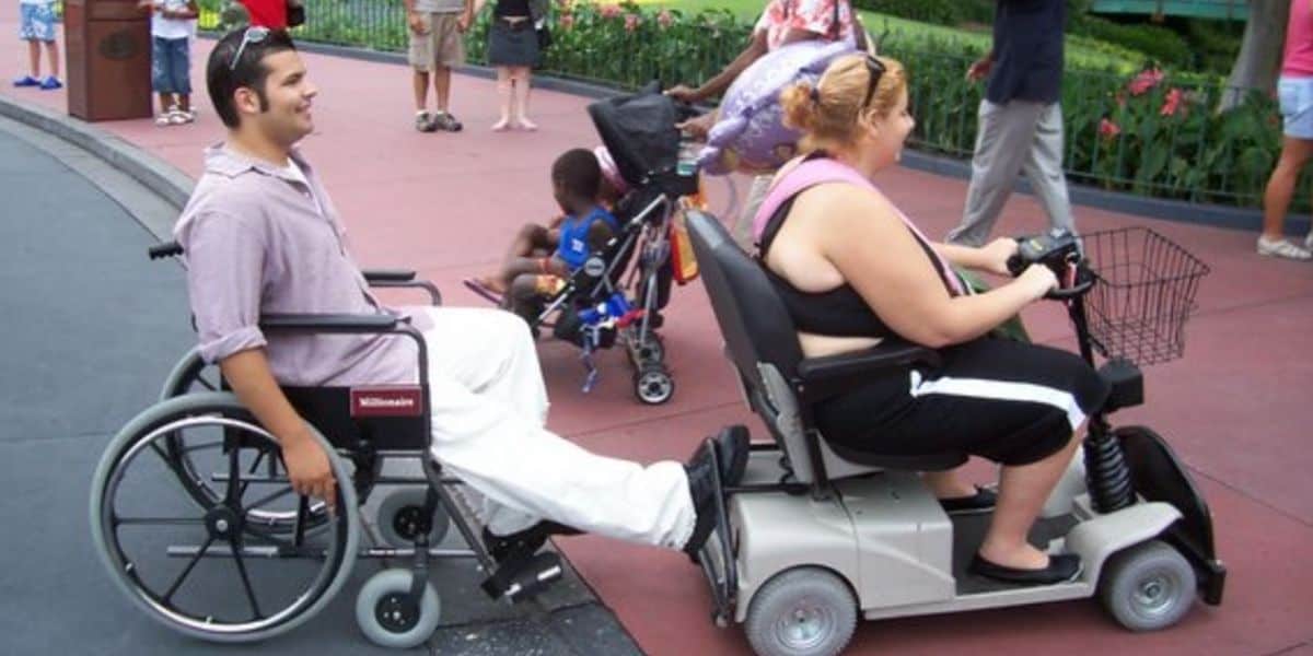 Guests playing with an ECV and a wheelchair at Disney World
