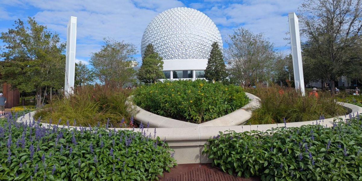 Spaceship Earth stands tall behind the World Celebration gardens at EPCOT