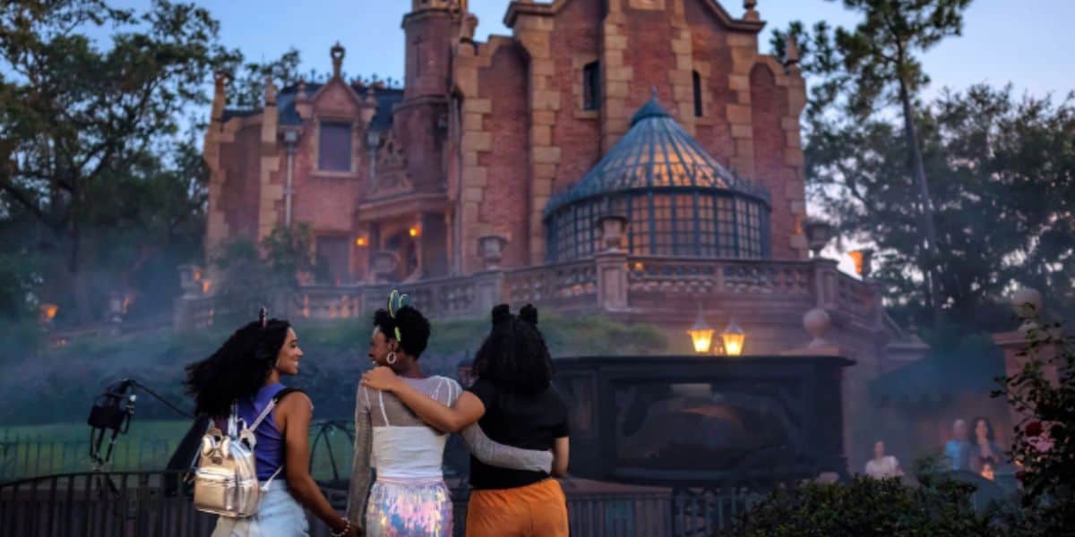 disney world guests at haunted mansion in magic kingdom