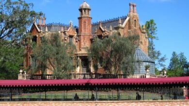 The Haunted Mansion at Magic Kingdom as seen from the Rivers of America.