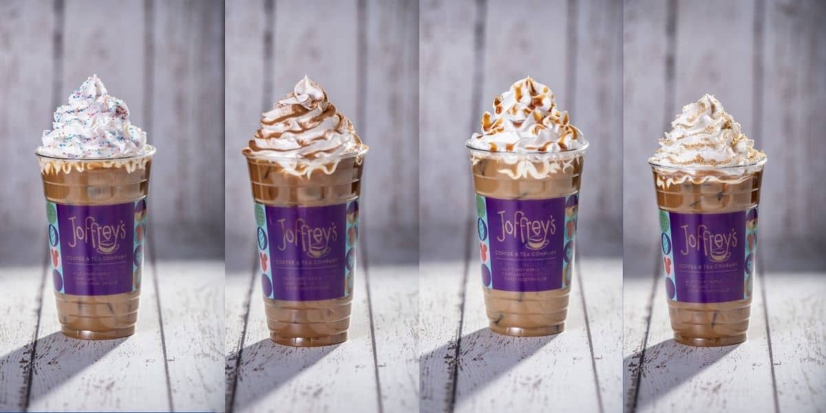 A lineup of four refreshing iced coffees topped with fluffy whipped cream served in Joffrey’s cups, ready to be enjoyed on a Walt Disney World park day.