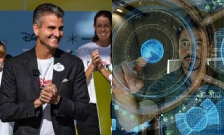 split image: on the left, Josh D'Amaro claps. on the right, Tony Stark using JARVIS