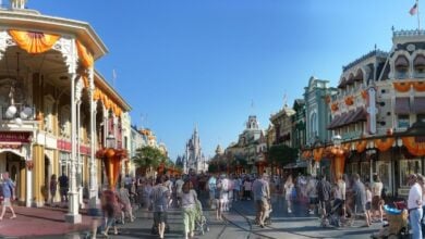 Guests stroll down Main Street, U.S.A. at Magic Kingdom