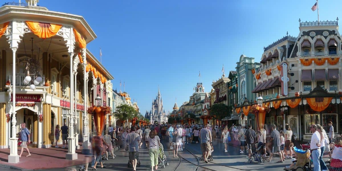 Guests stroll down Main Street, U.S.A. at Magic Kingdom