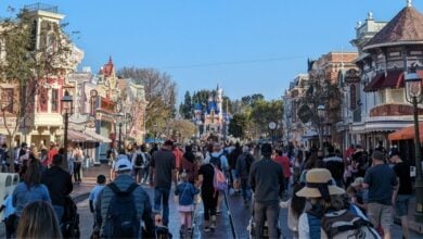 Guests stroll along Main Street USA at Disneyland Park