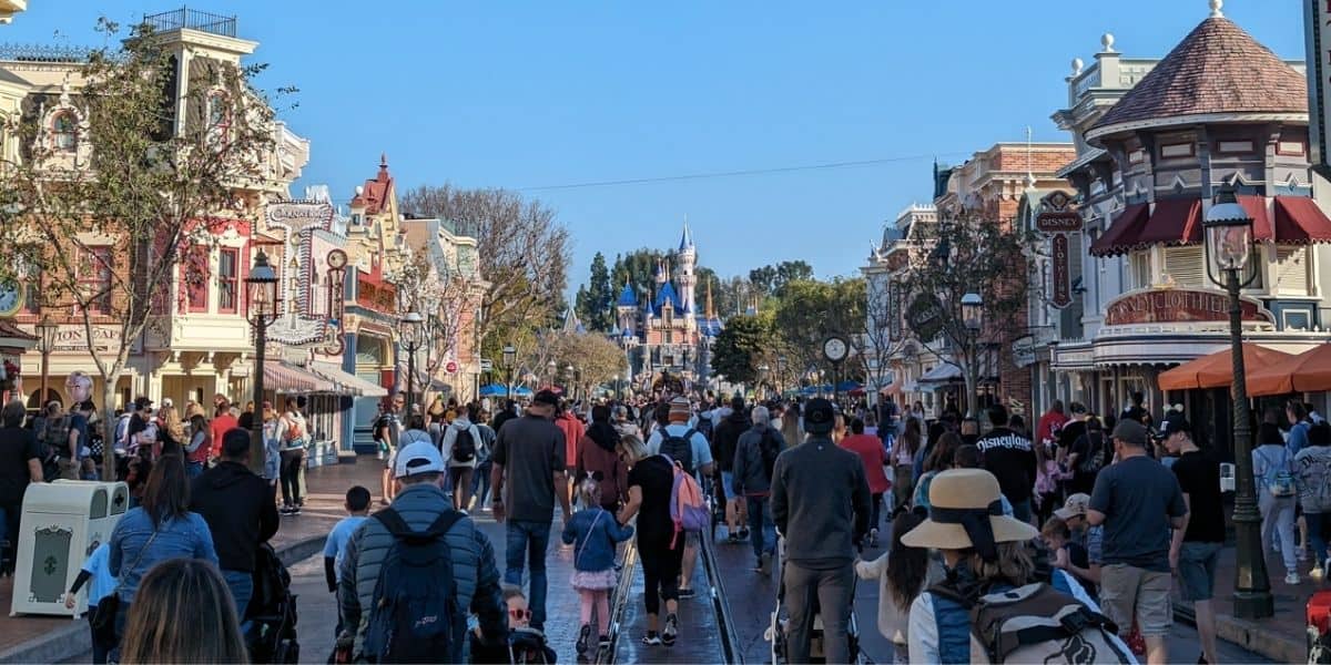 Guests stroll along Main Street USA at Disneyland Park