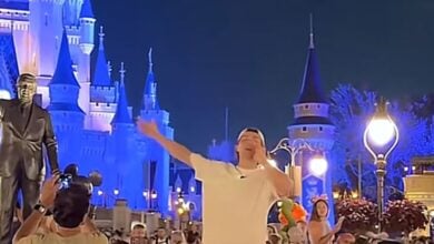 Man preaching in front of Cinderella Castle at Magic Kingdom