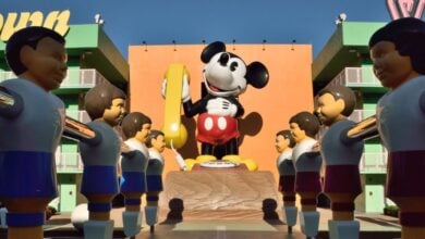 An oversized fooseball court and the Mickey Mouse phone at Disney's Pop Century Resort