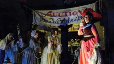 Redhead in Pirates of the Caribbean auction scene