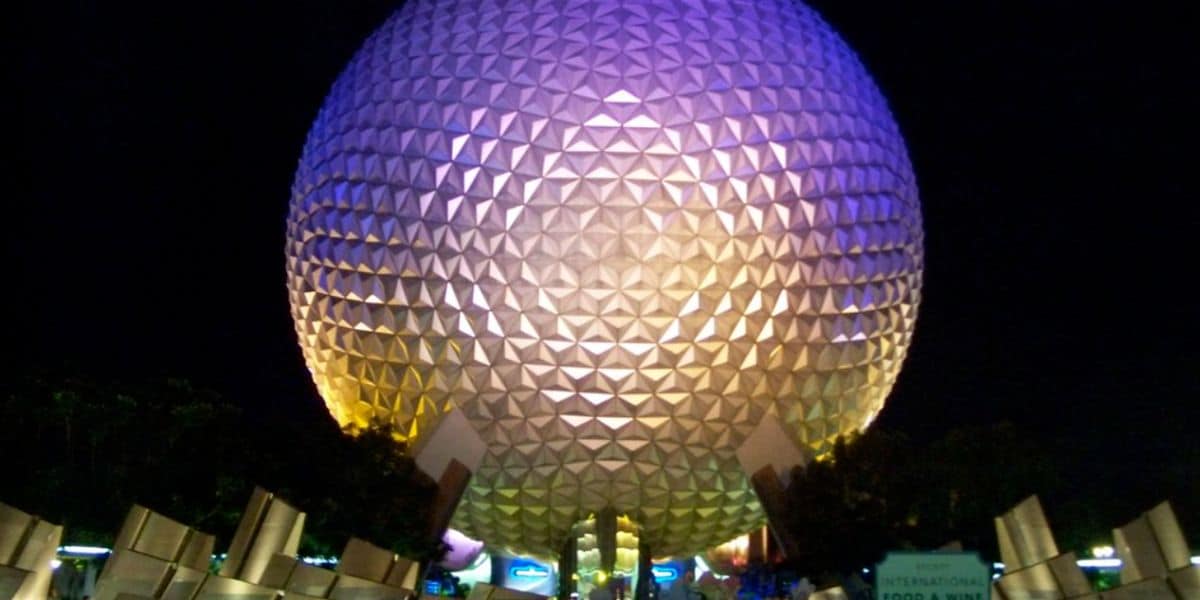 Spaceship Earth glowing at night at EPCOT