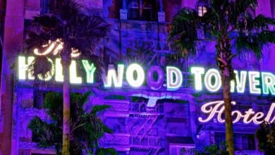 The iconic Hollywood Tower Hotel sign illuminates the night