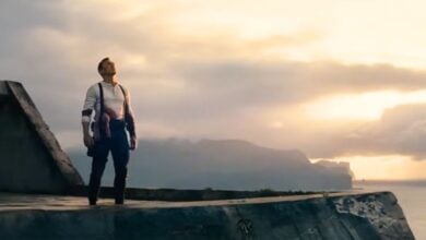 James Bond (Daniel Craig) looking up at the sky in 'No Time to Die'