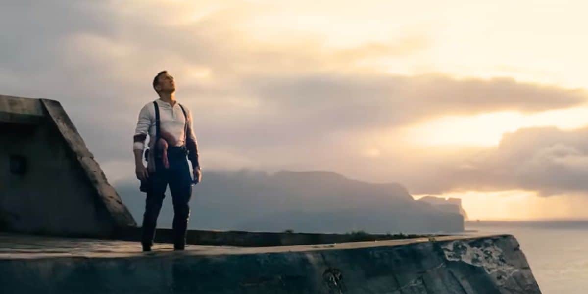 James Bond (Daniel Craig) looking up at the sky in 'No Time to Die'