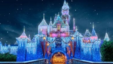 Sleeping Beauty Castle at Disneyland sparkles with festive lights for holiday season
