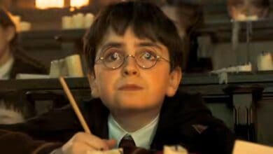 Dominic McLaughlin as Harry Potter in class at Hogwarts
