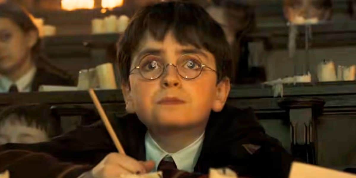 Dominic McLaughlin as Harry Potter in class at Hogwarts