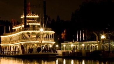 The Mark Twain Riverboat sails the Rivers of America at Disneyland at night