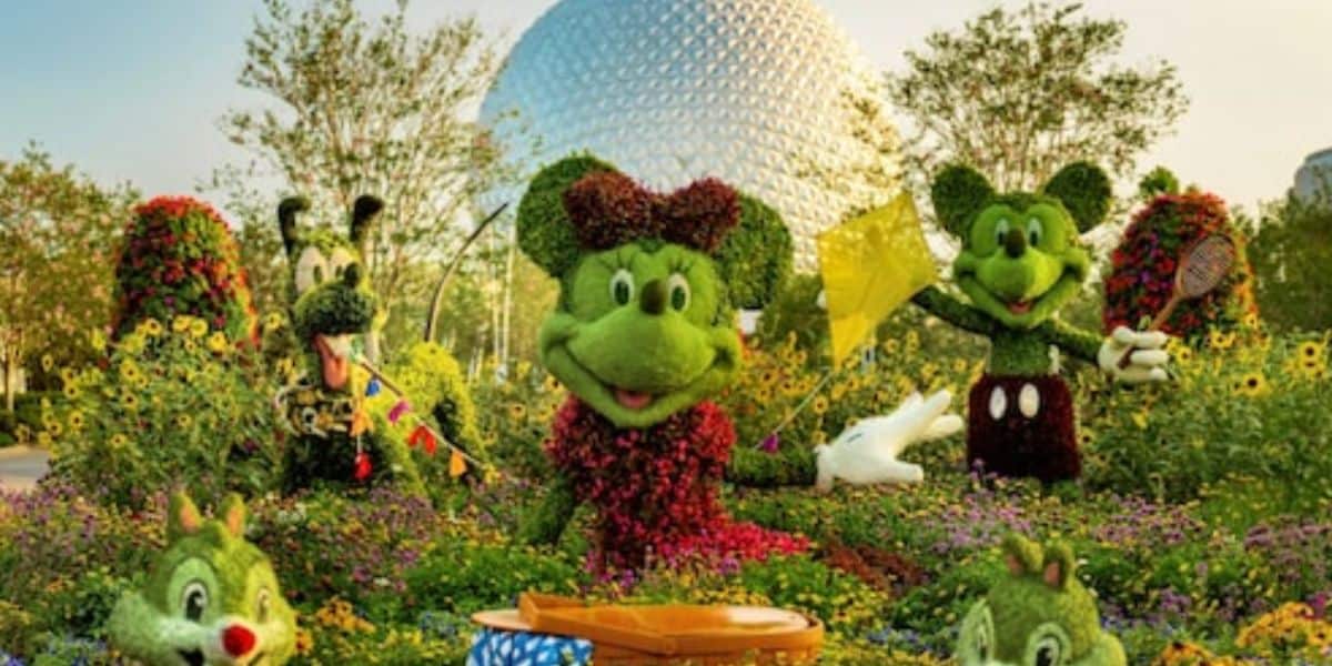 Minnie, Mickey, Pluto, and Chip and Dale topiaries at EPCOT International Flower & Garden Festival in front of Spaceship Earth