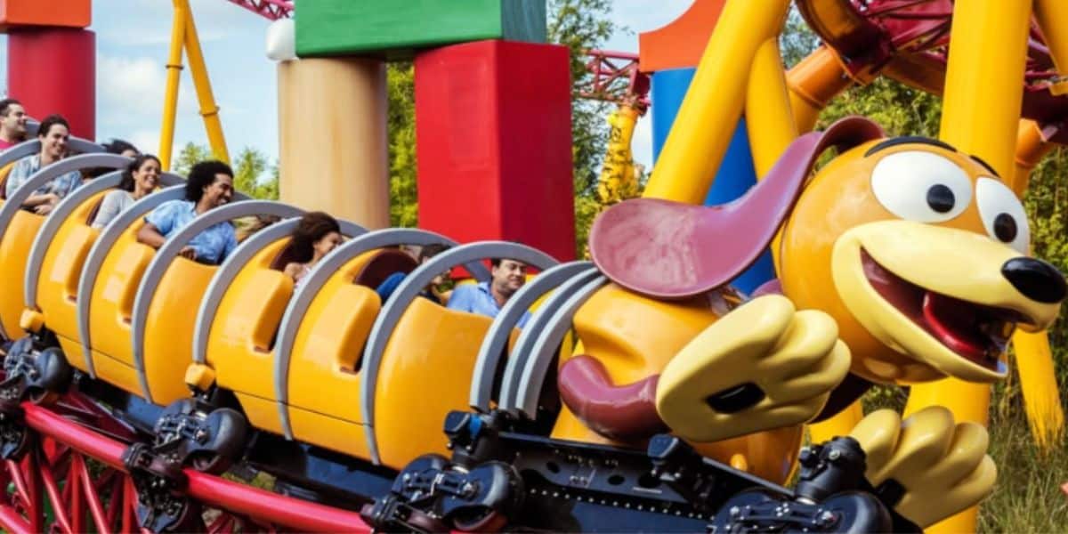 guests ride slinky dog dash in disney world's hollywood studios park