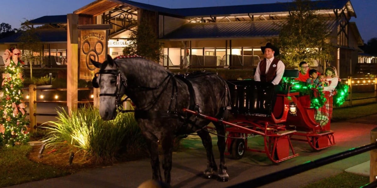 A horse-drawn holiday sleigh ride at Tri-Circle-D Ranch in Disney’s Fort Wilderness Resort.