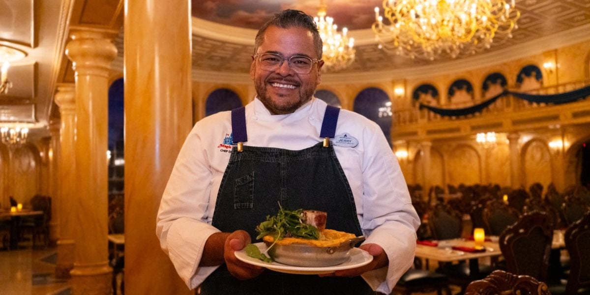 Chef de Cuisine Jerry presenting a dish at Be Our Guest in Magic Kingdom.