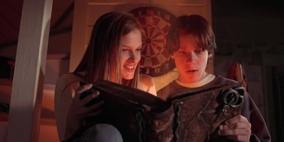Max and Allison reading the Book of Spells in Hocus Pocus (1993)