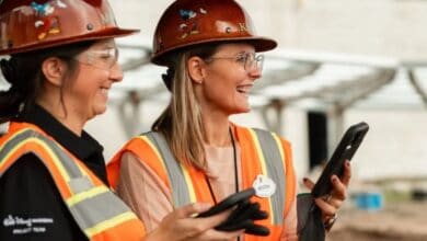 walt disney world imagineers holding cell phones construction